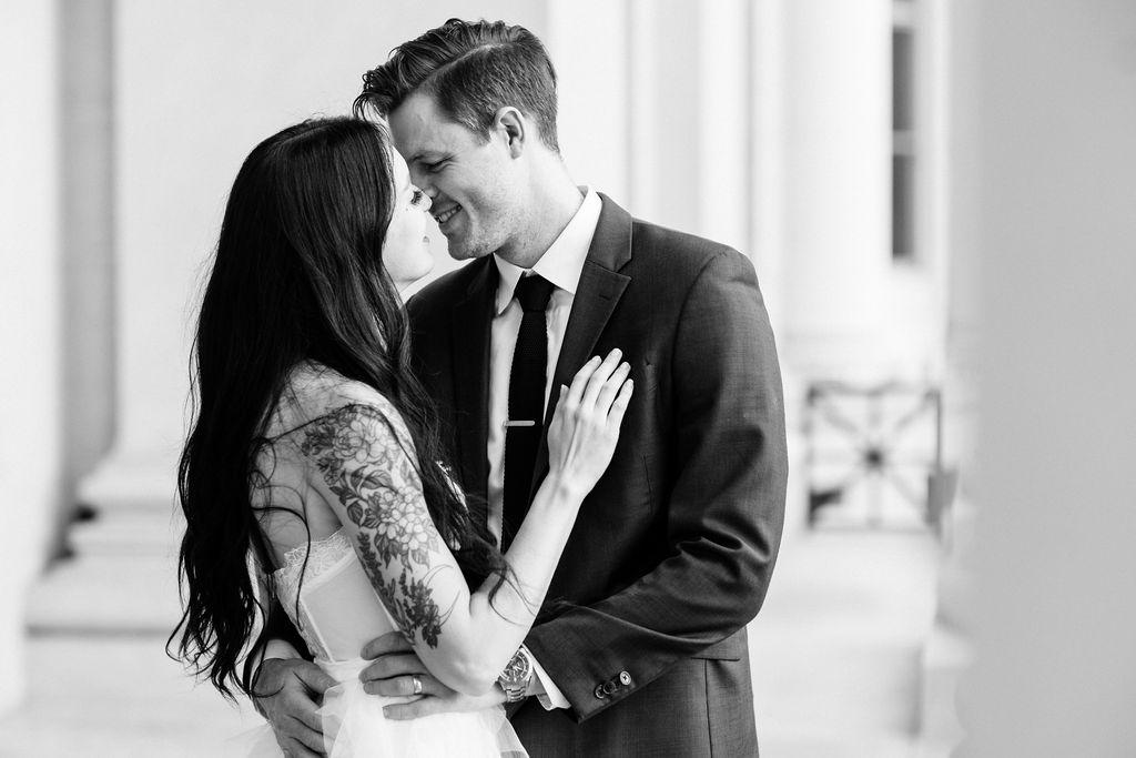 bride and groom face each other during denver elopement