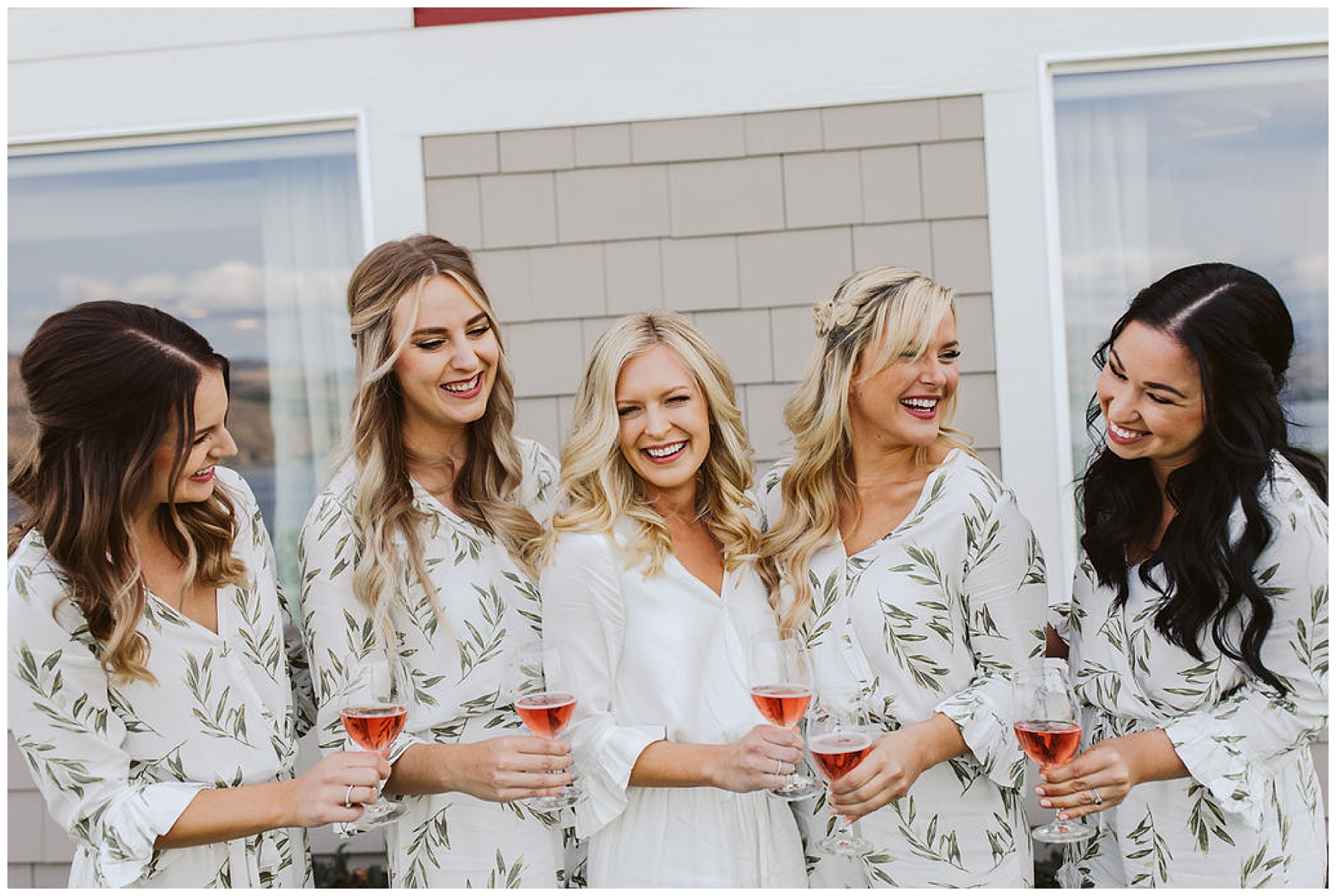 bridesmaids share a drink with the bride before the wedding at Karma Vineyards