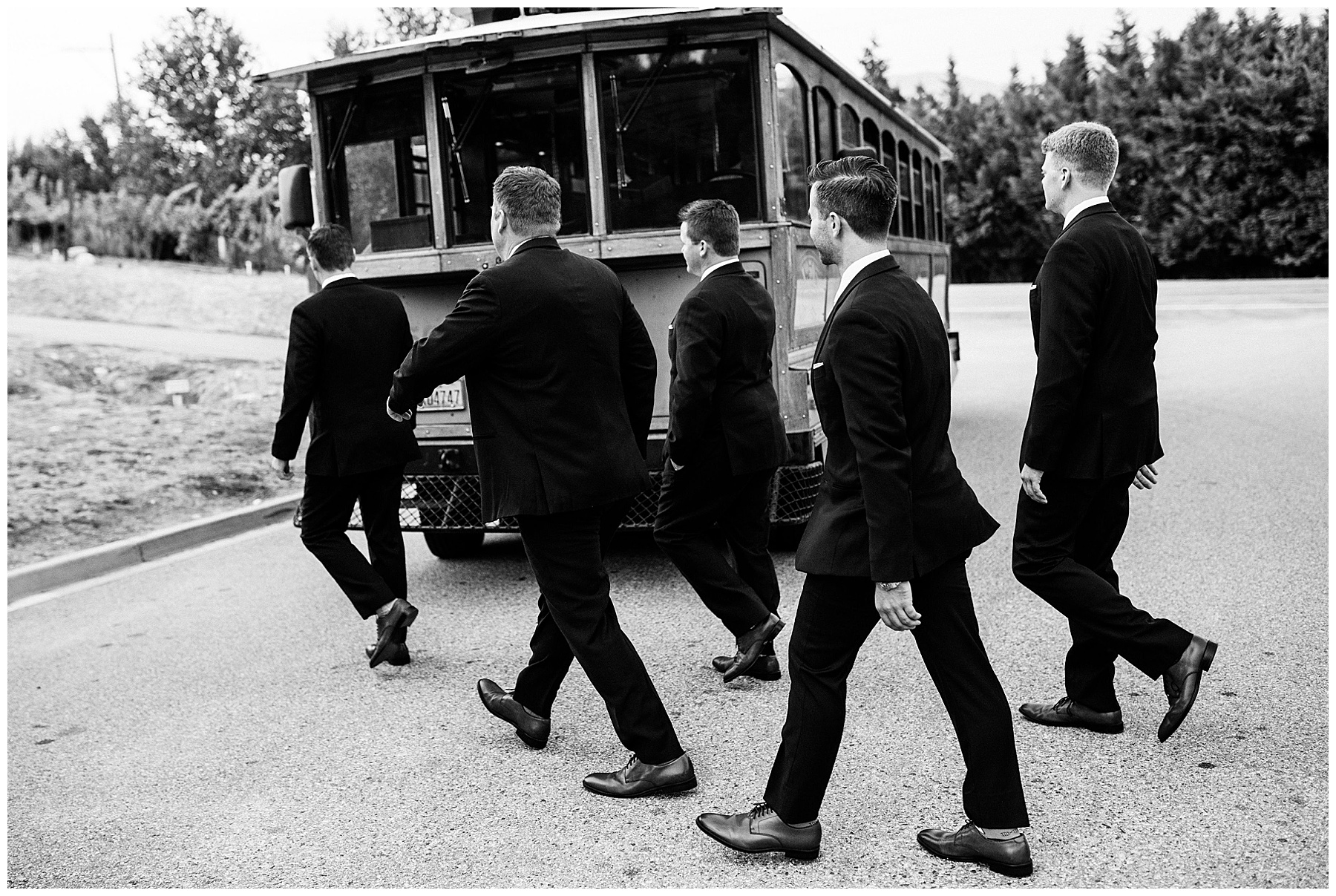 groomsmen get on board the trolley.