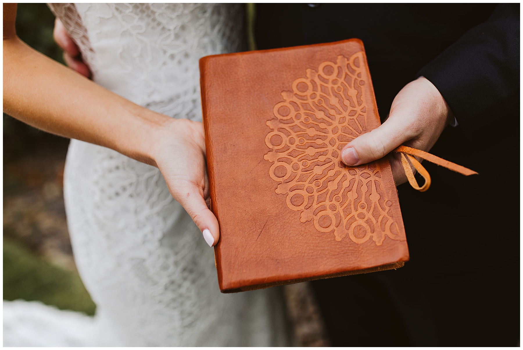 couple shows the journal they've shared since 2011, where they wrote their personal vows for their wedding day at Karma Vineyards.
