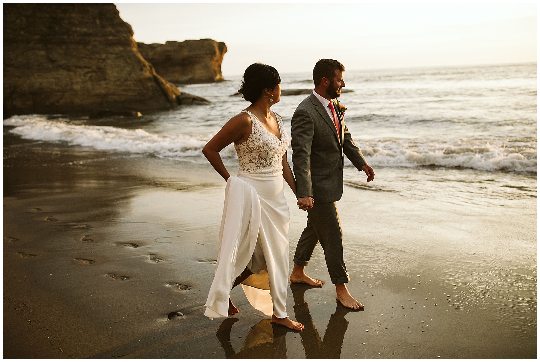couple explores the beach in their wedding attire. they considered the reasons to elope and wanted a stress free experience like this!