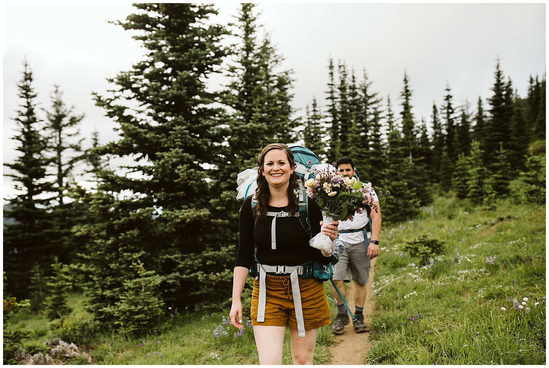 emily and jay hiking in mount rainier before their elopement.