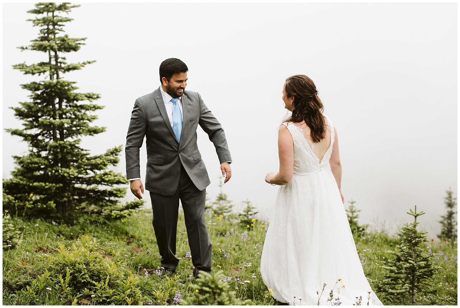 jay reacts to seeing emily for the first time before their elopement at mount rainier.