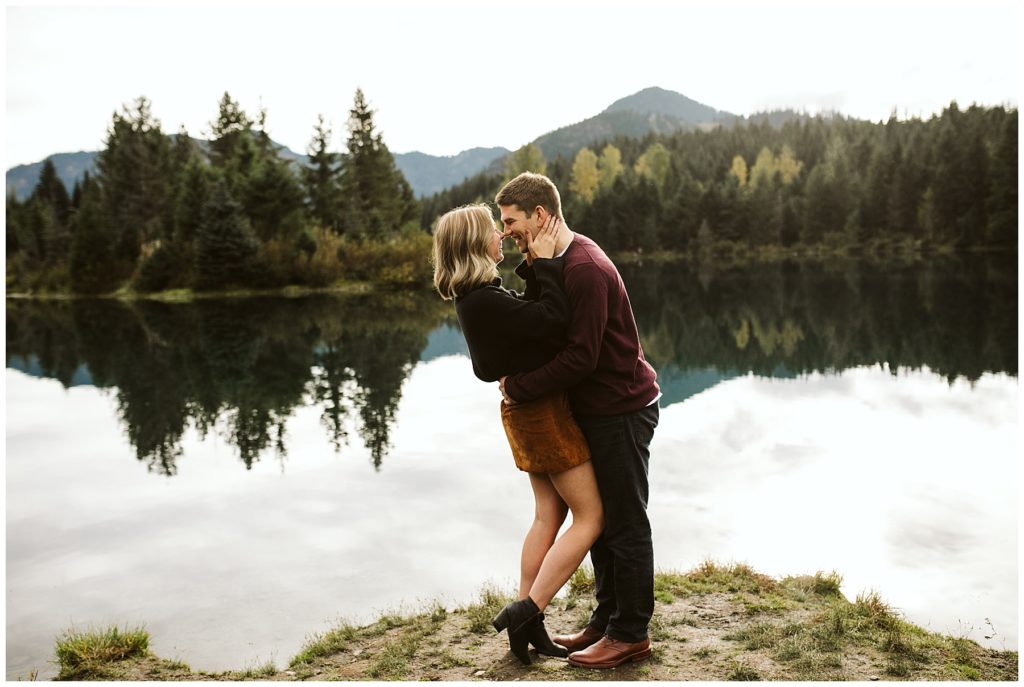 fall engagement shoot maroon sweater trees in background