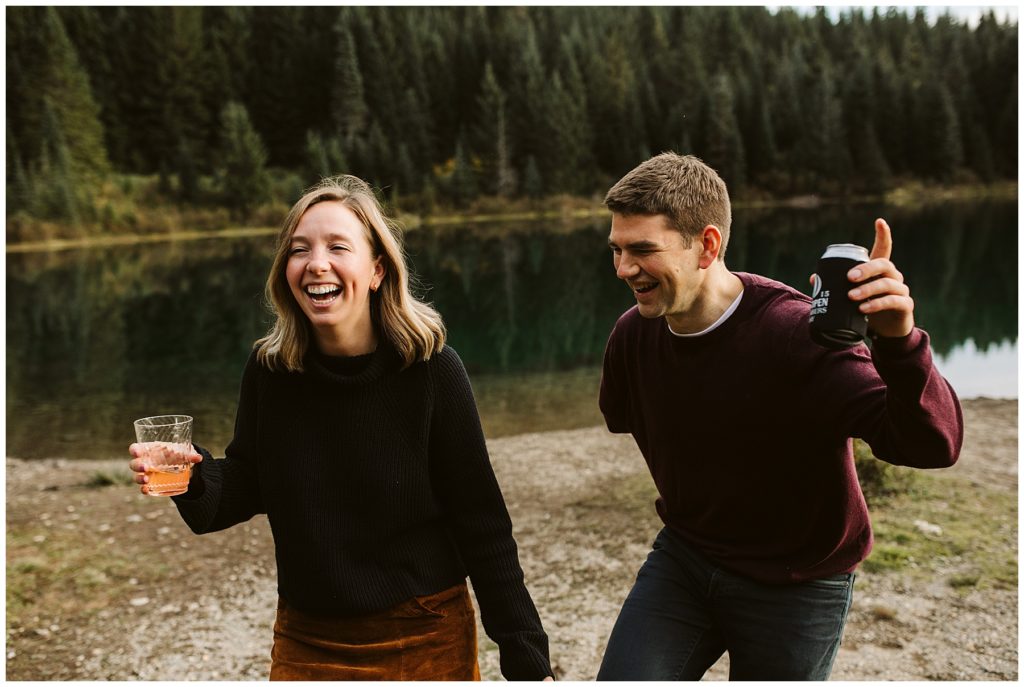 couple laughing with drinks