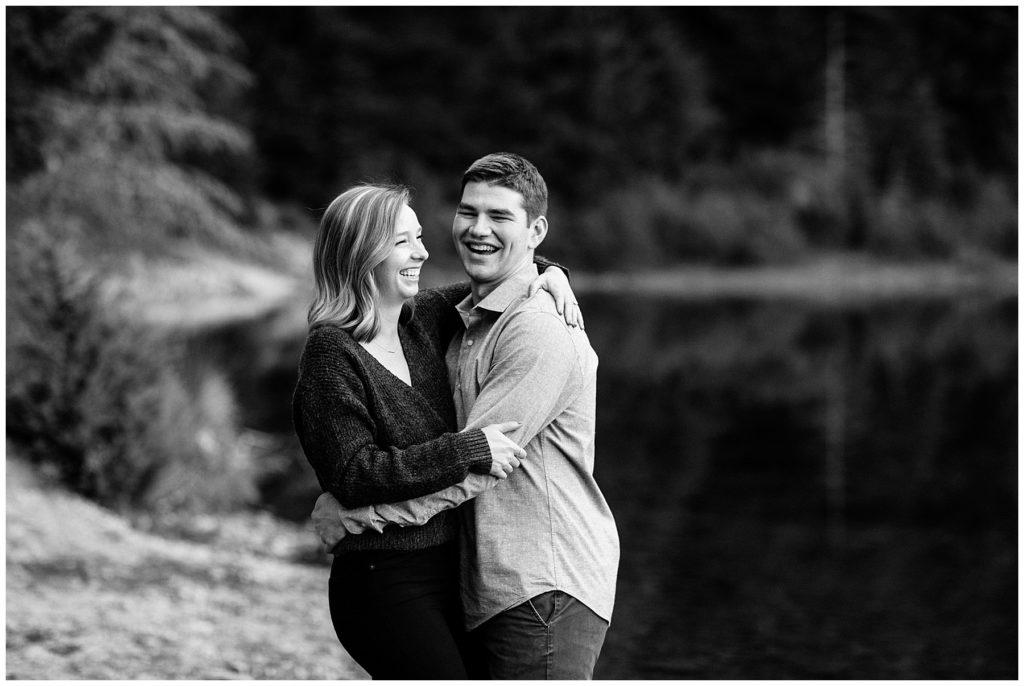 fall engagement shoot outfits lake with trees