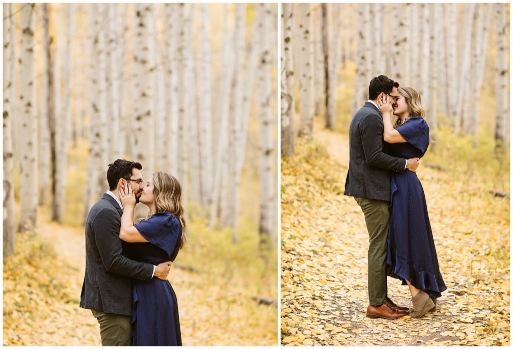 couple kissing in yellow aspen tree forest