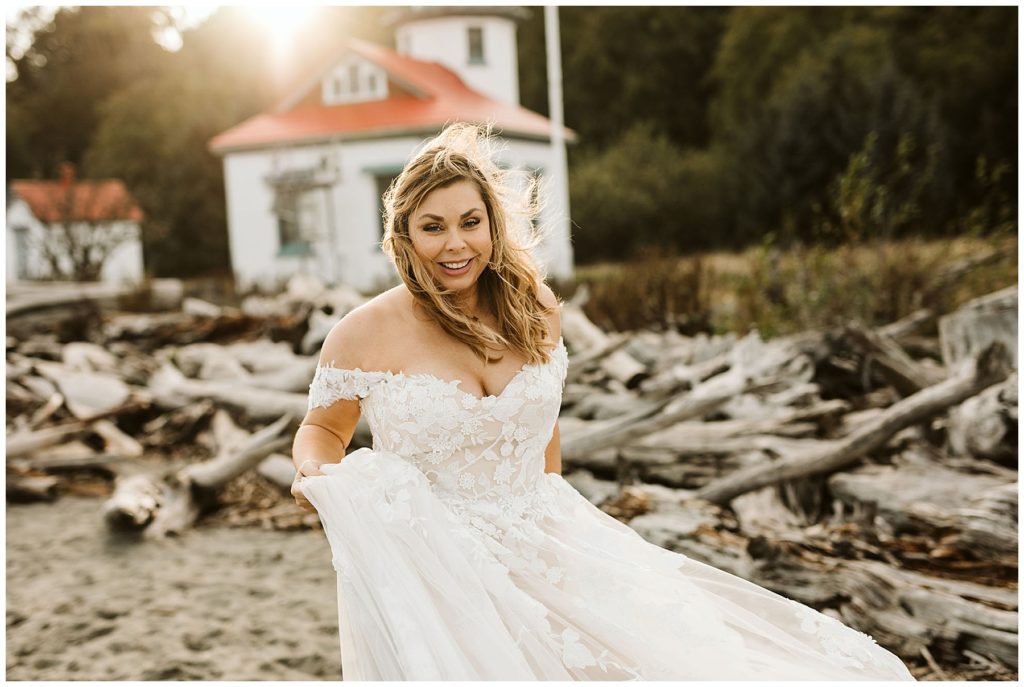 women with flowing wedding dress on the beach
