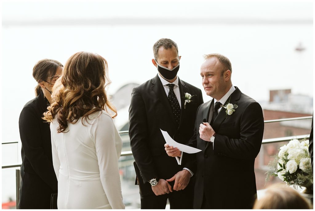 groom reading his vows 