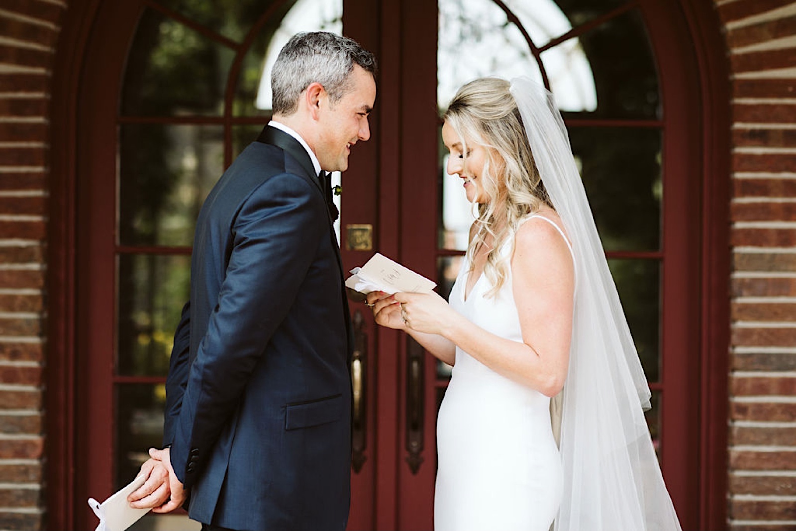 Vibrant Wedding At Siren Song Vineyard: bride and groom exchange private vows
