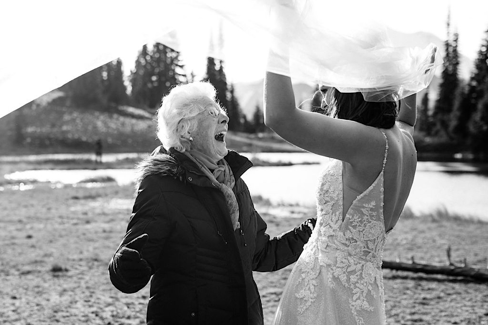 bride shares a moment with her grandmother at mt. rainier elopement