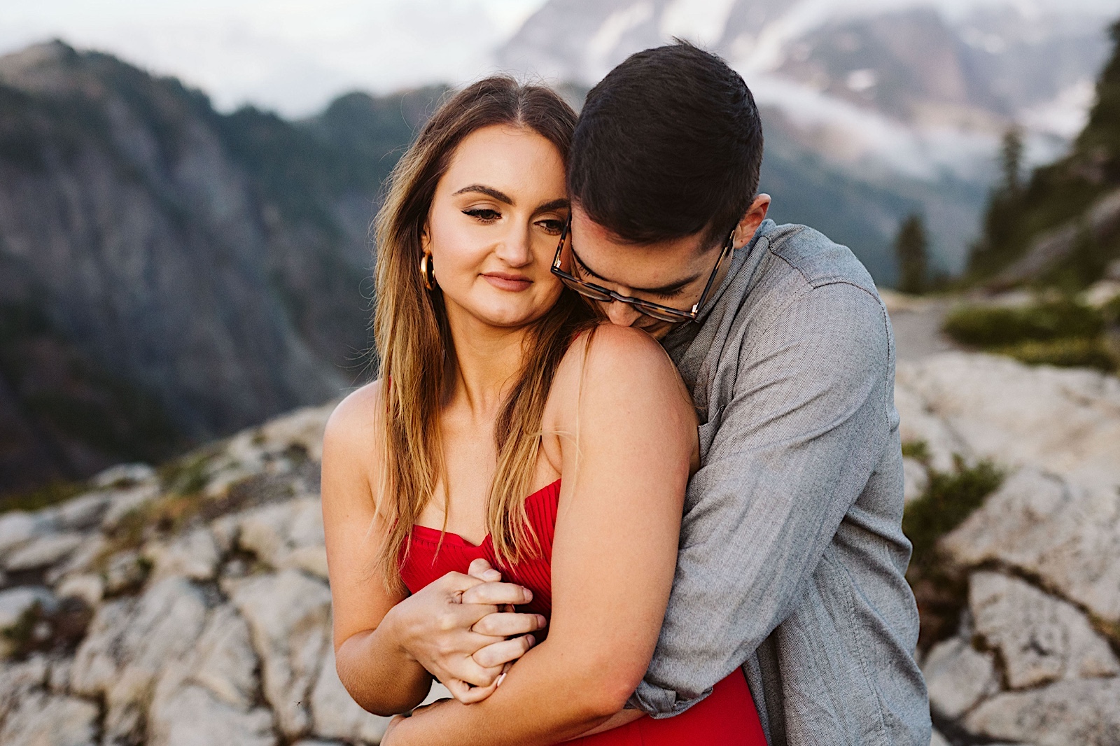couple hugs at their engagement session at mt. baker