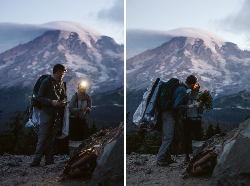 couple-hiking-at-the-base-of-mount-rainier-at-night-time