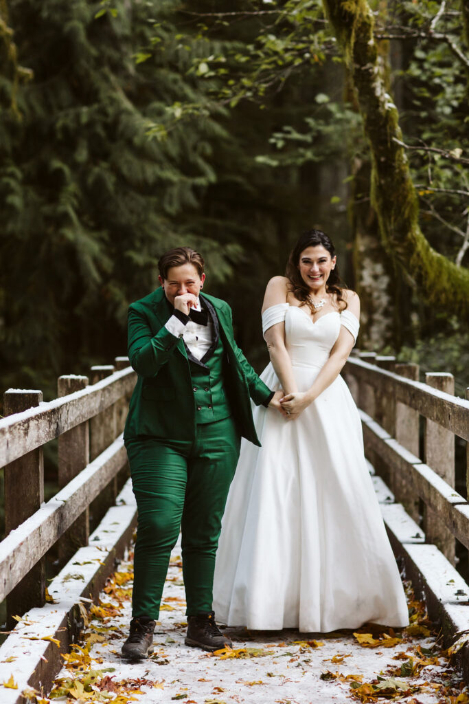 two brides celebrate in middle of forest