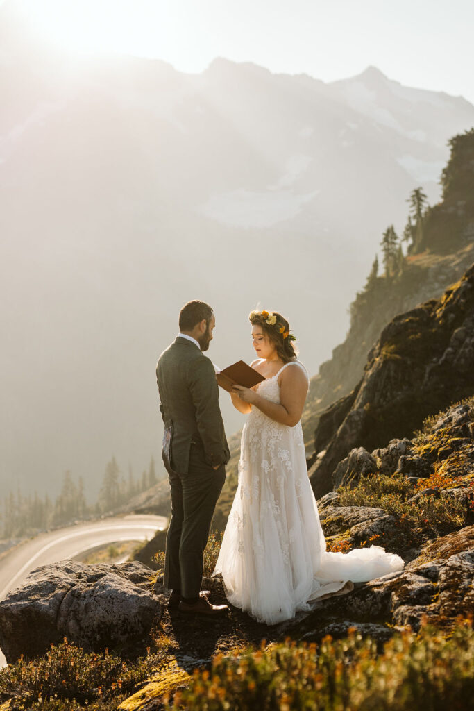 bride and groom read vows during north cascades elopement