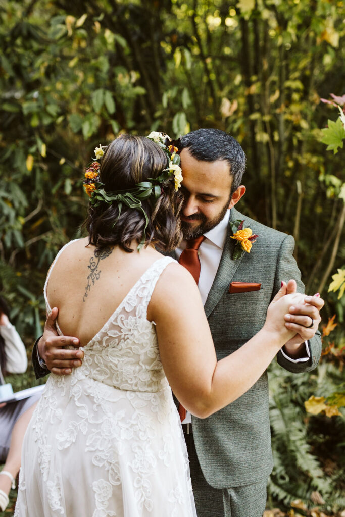 bride and groom first dance during airbnb elopement