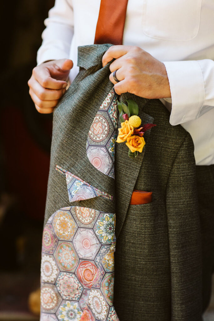 suit jacket with yellow flowers and colorful liner