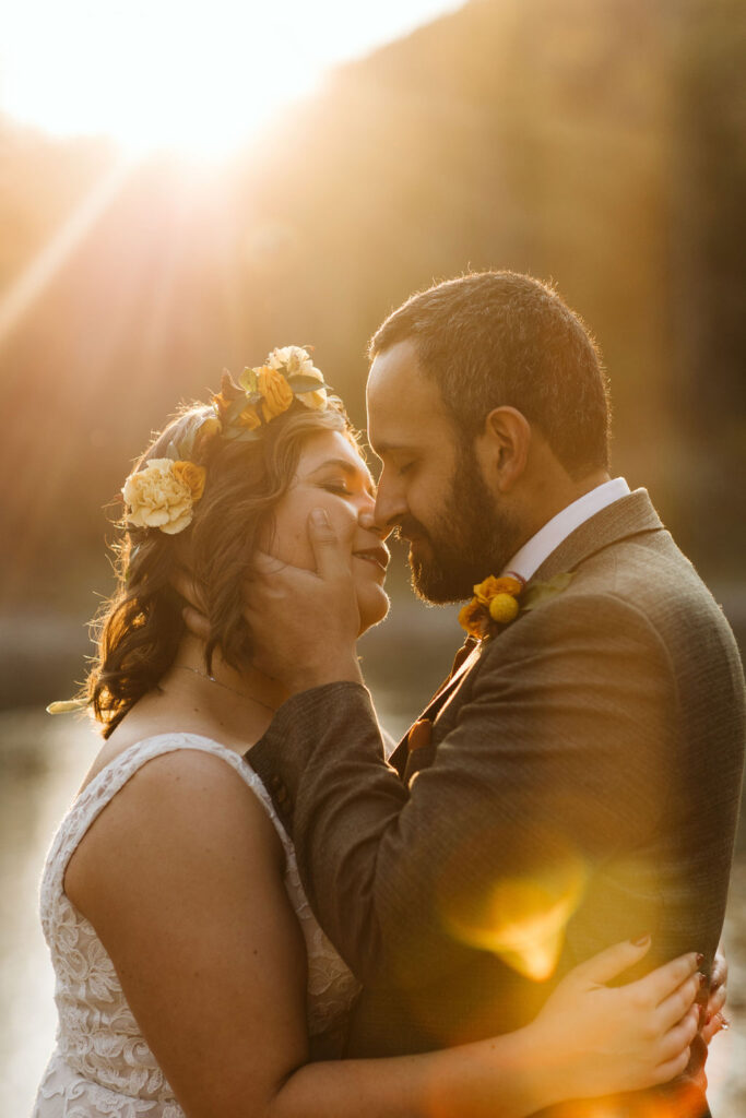 bride and groom almost kiss during sunset session