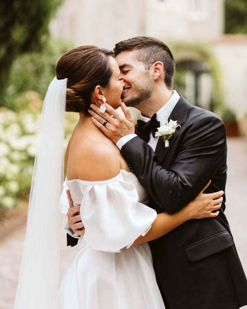 bride and groom kiss 