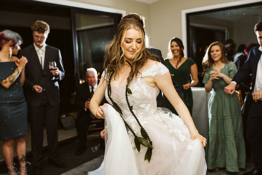 bride dances with guests