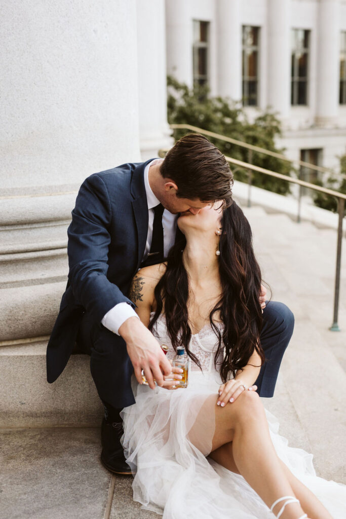 bride and groom kiss during denver elopement