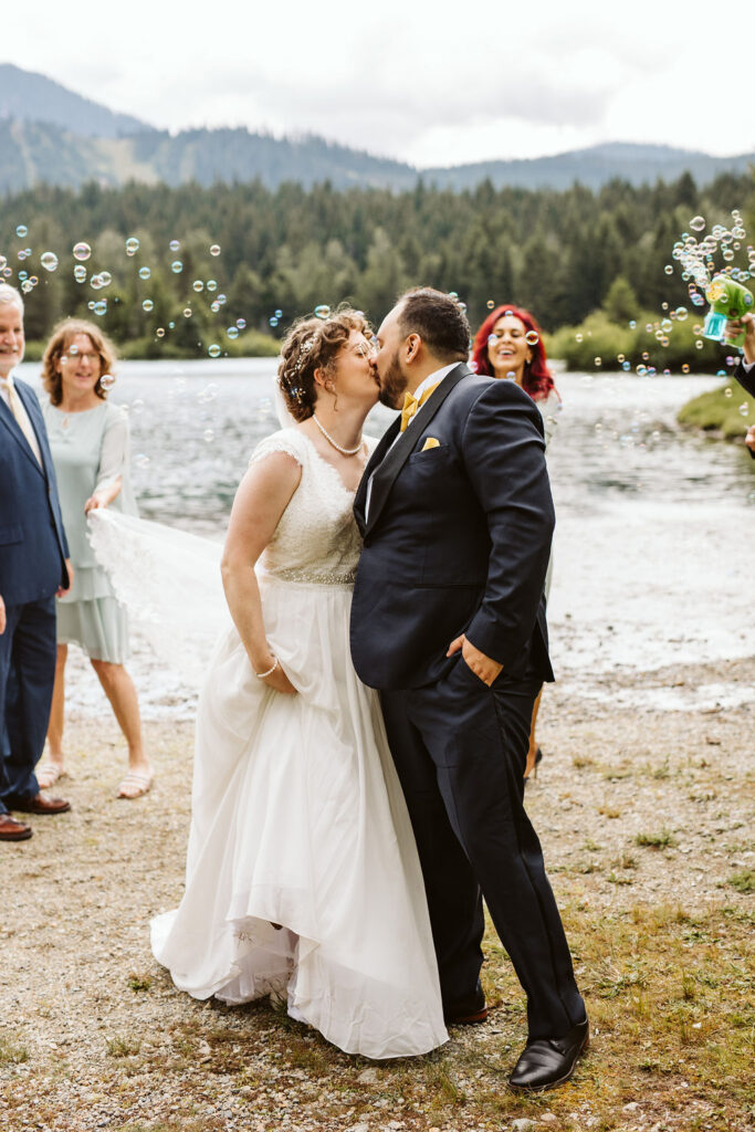 bride and groom kiss at the end of elopement
