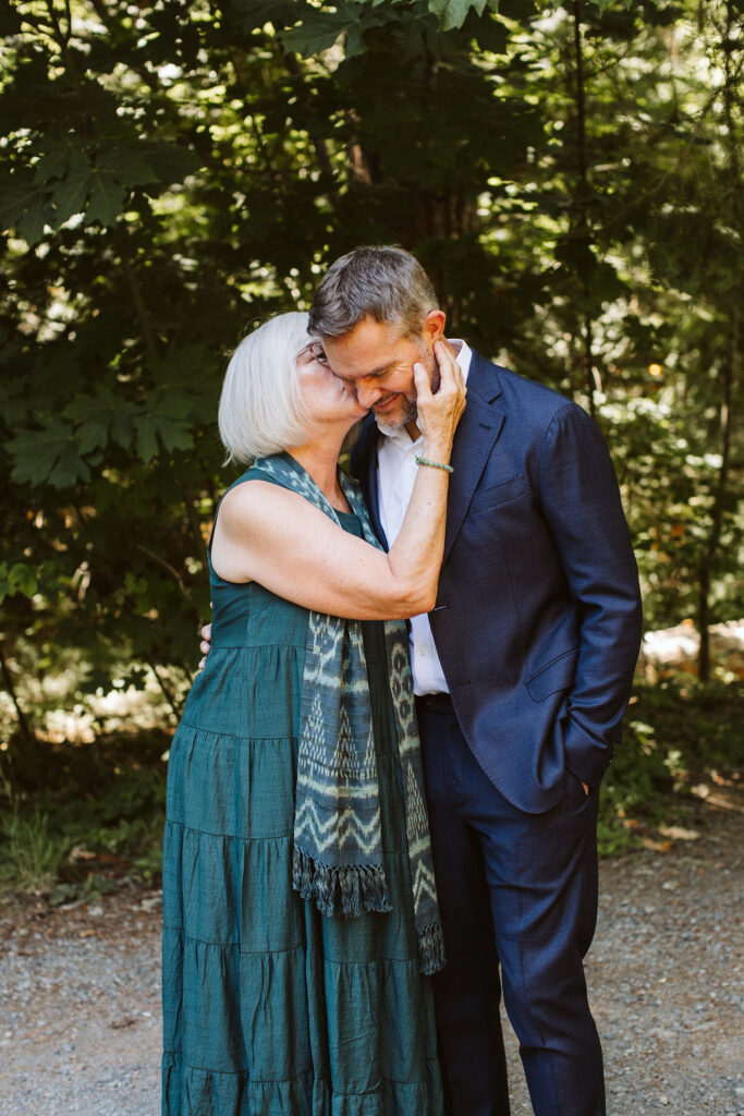 groom and older woman hug
