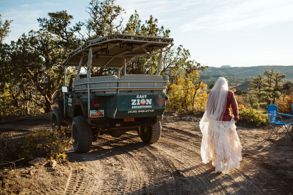 bride walks up to offroad jeep