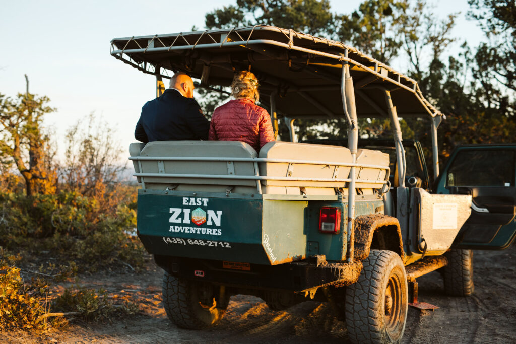 bride and groom in off road jeep